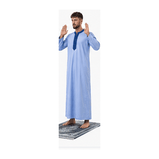 Standing with hands raised for the opening takbir